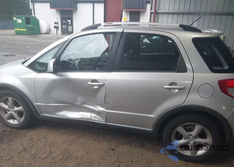 2009 Suzuki Sx4 Touring z USA, uszkodzony, nr VIN JS2YB417896200835